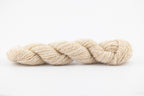 An cream, undyed skein of Wensleydale Muga silk.