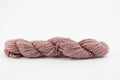 A lavender skein of teeswater and muga silk dyed with cochineal. 