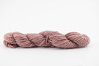 A lavender skein of teeswater and muga silk dyed with cochineal. 
