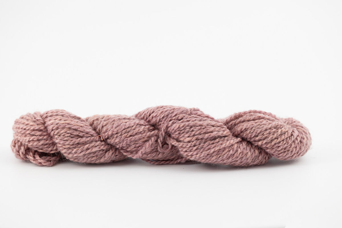A lavender skein of teeswater and muga silk dyed with cochineal. 