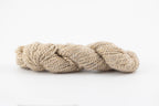 An undyed skein of teeswater and muga silk. It is a lovely cream color with gold flecks.