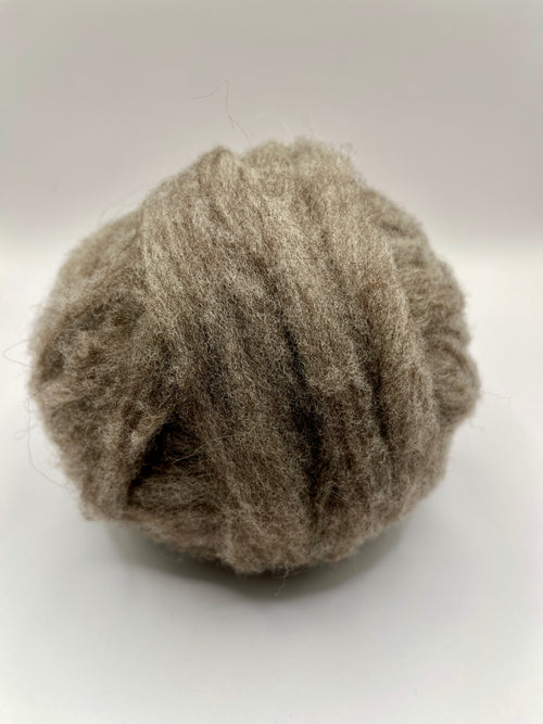 Gray merino roving in a ball
