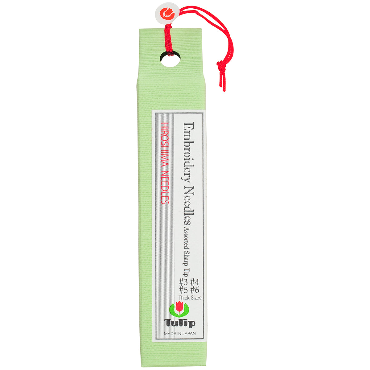 Packaging of Hiroshima Needles with a red string on a white background
